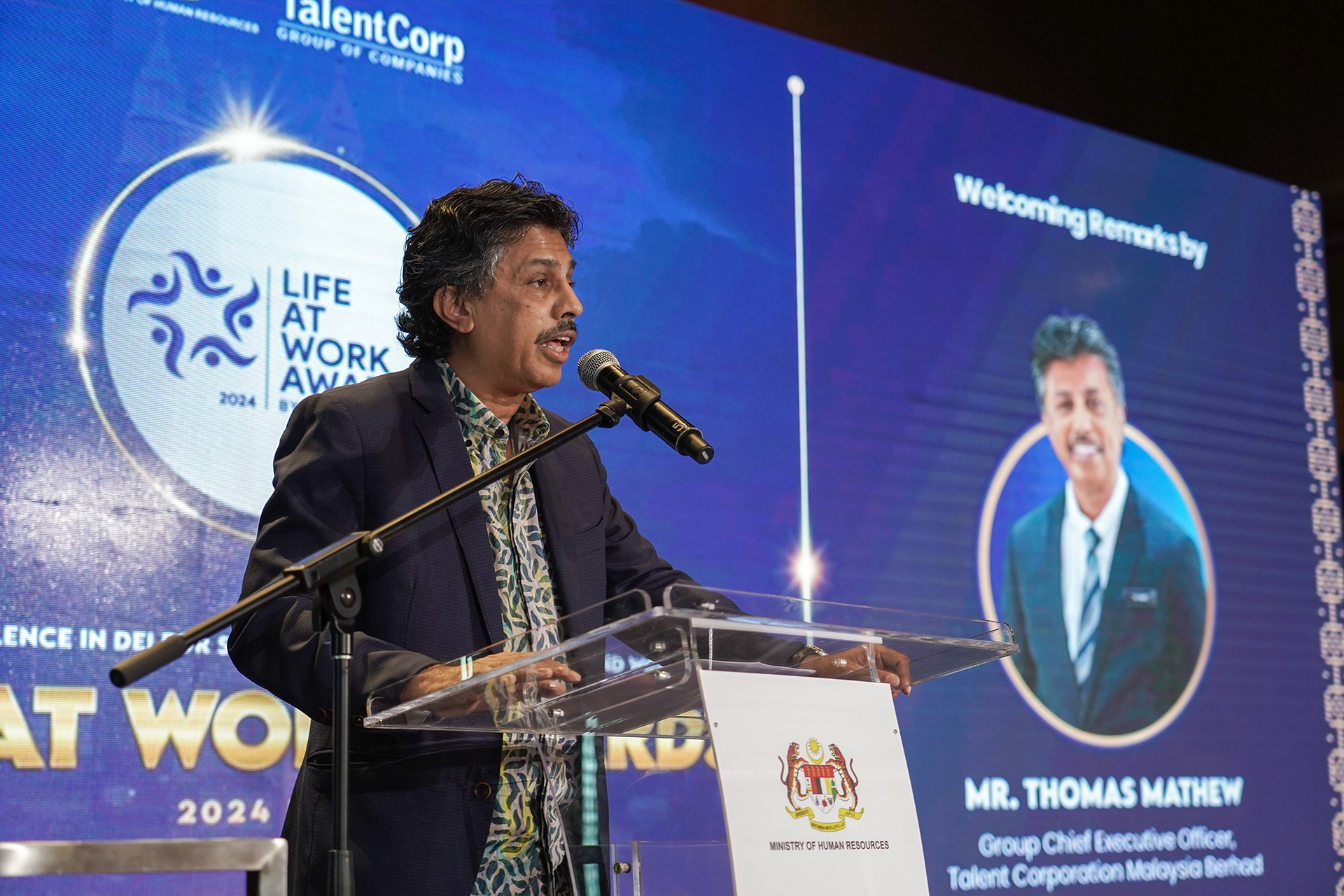 Mr Thomas Mathew, TalentCorp Group CEO delivering his speech during the launch of LIFE AT WORK Awards 2024.